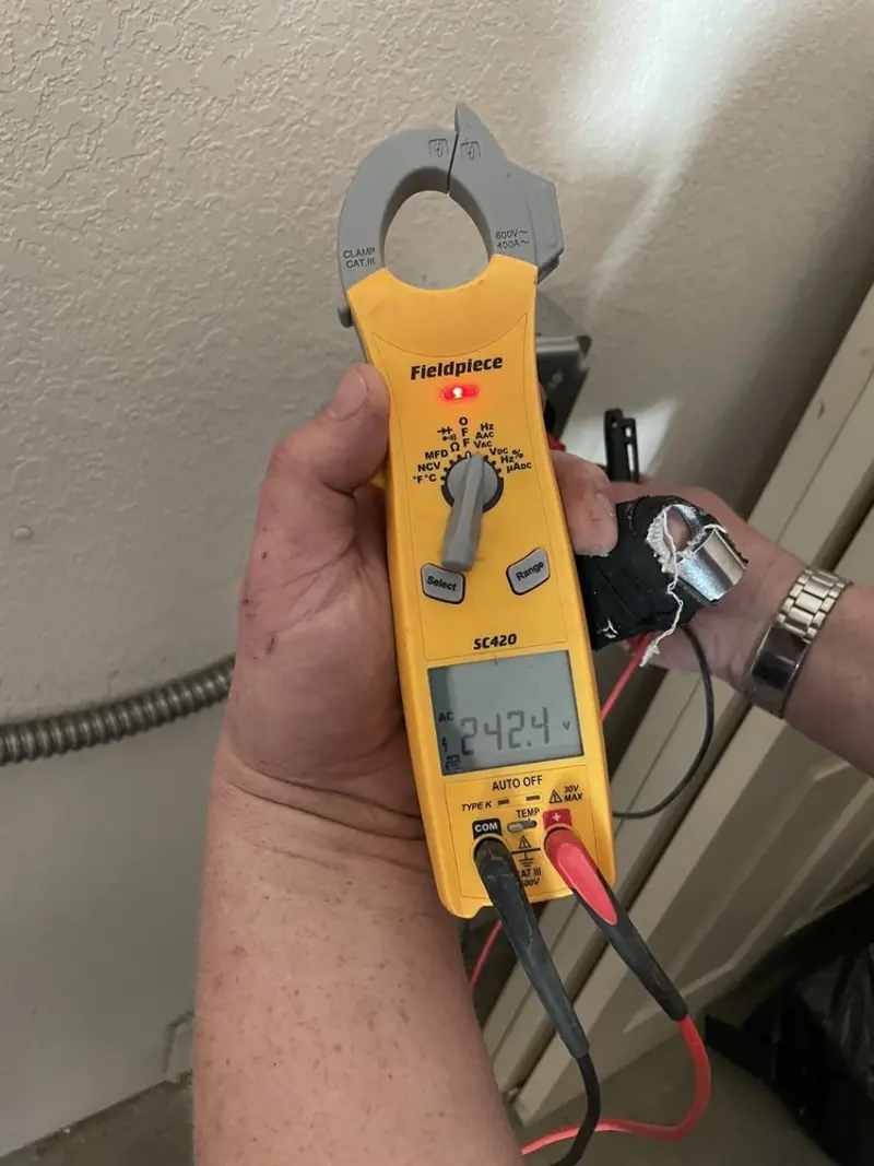 Voltage testing with clamp meter during Hot Tub / Pool Electrical Wiring in Moyock
